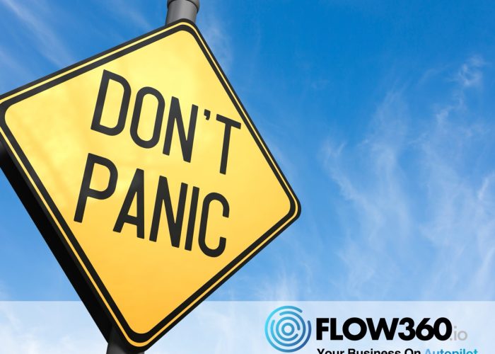 Ein Straßenschild vor blauem Himmel auf dem steht: Don´t panic